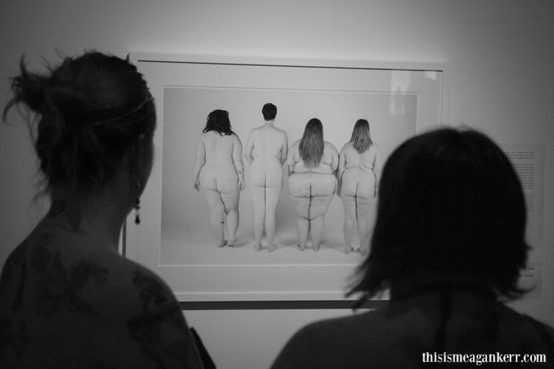 Gallery visitors looking at Fat Bottomed Girls