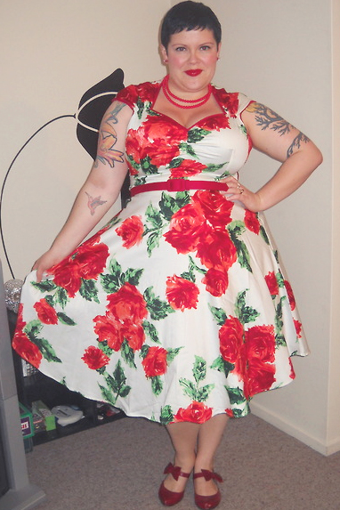 Cara Hill wears Pinup Girl Clothing Heidi dress