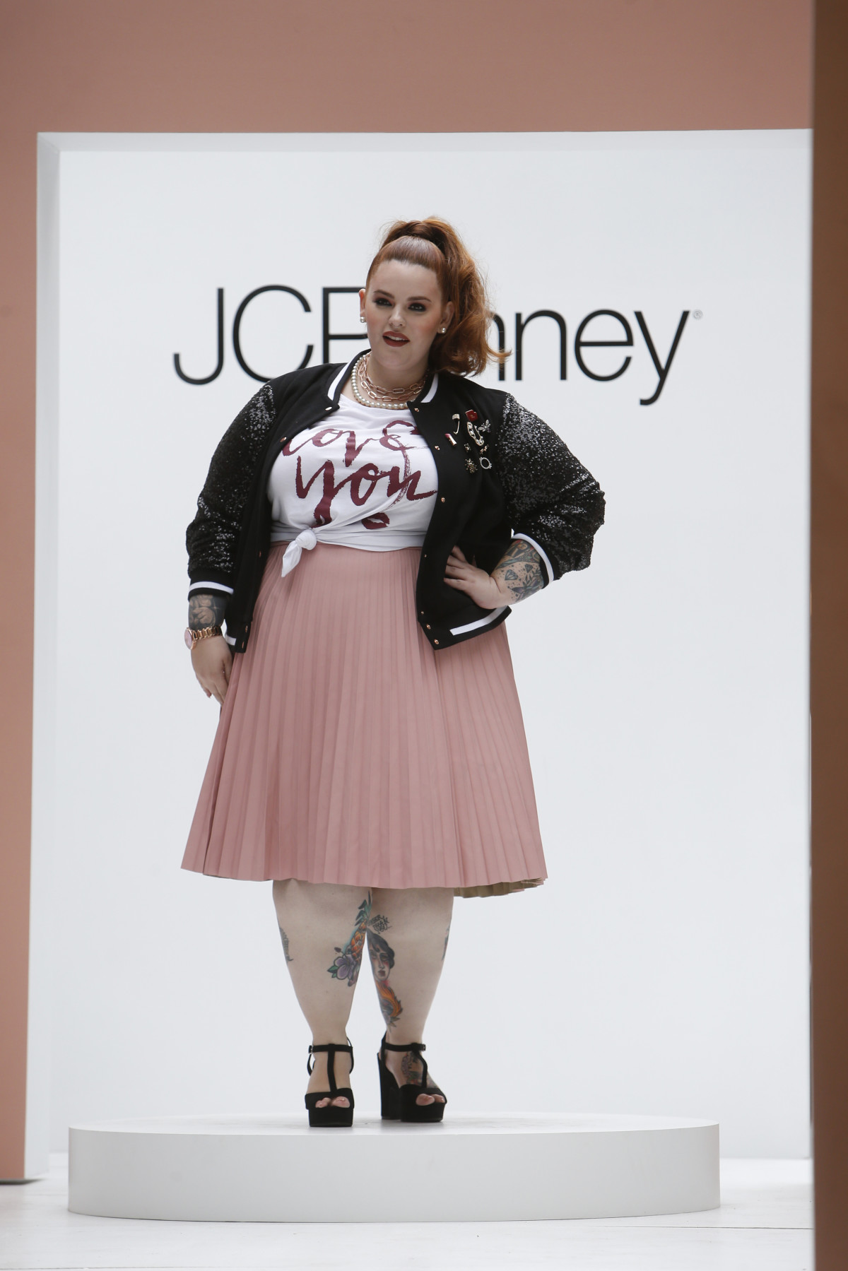 Tess Holliday wears Ashley Nell Tipton for JCPenney Boutique+ Fashion Show on Tuesday, Sept. 6, 2016, in New York. (Photo by Jason DeCrow/Invision for JCPenney/AP Images)