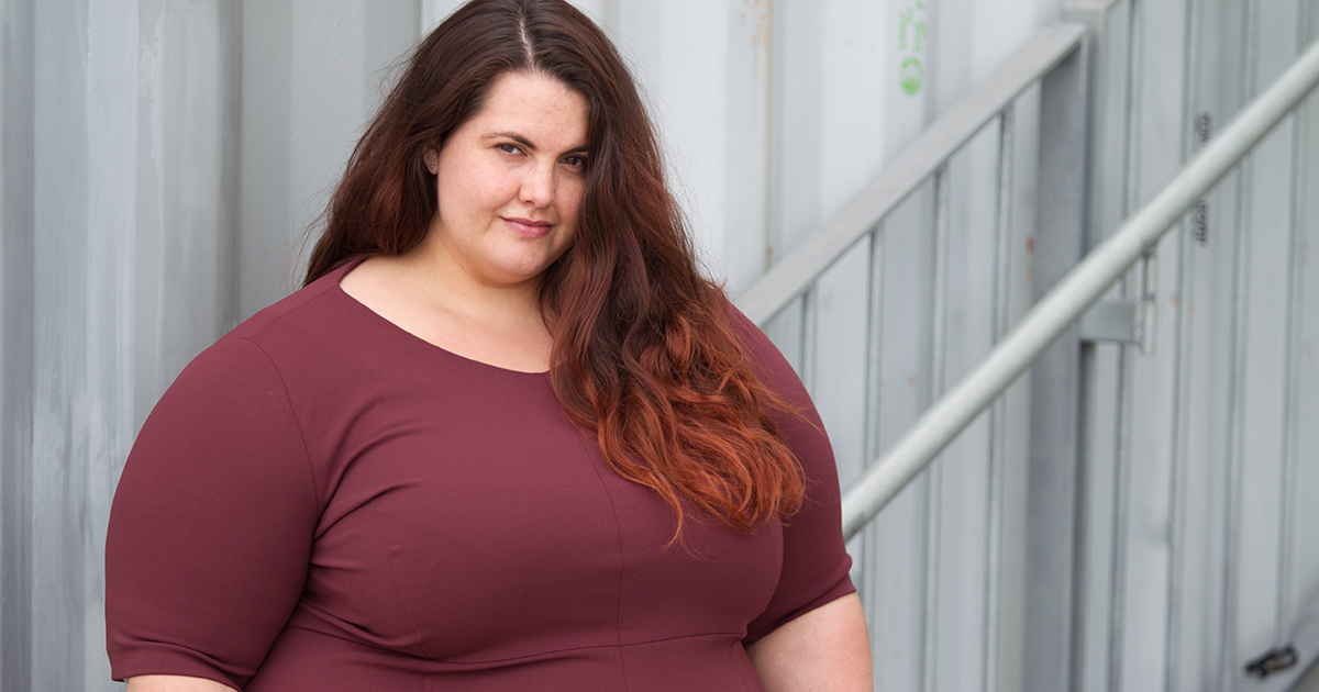 This is Meagan Kerr wears Navabi A Line Dress in wine - plus size workwear