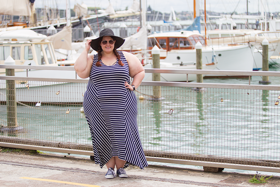 This is Meagan Kerr wears K&K Stripe Mixed Panel Dress and Wide Brim Sun Hat