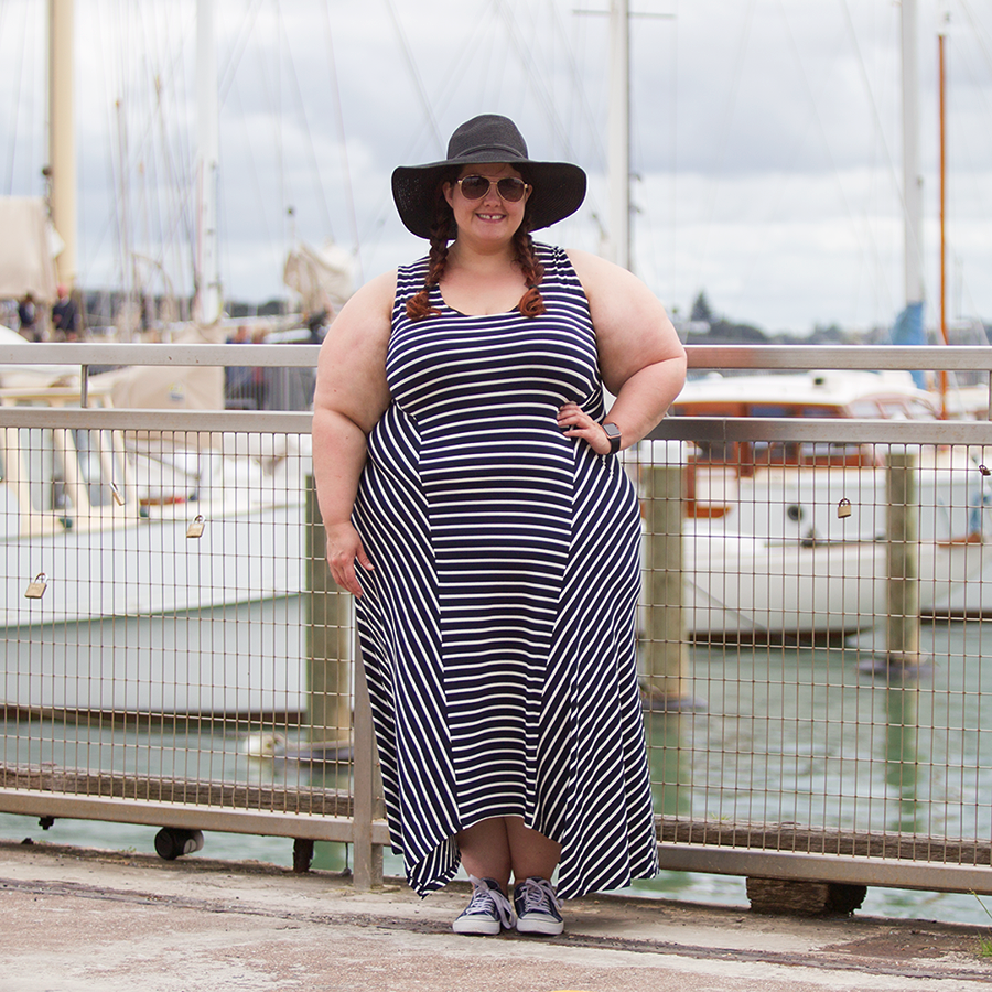 This is Meagan Kerr wears K&K Stripe Mixed Panel Dress and Wide Brim Sun Hat