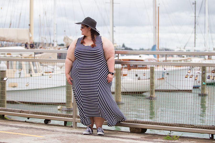 This is Meagan Kerr wears K&K Stripe Mixed Panel Dress and Wide Brim Sun Hat