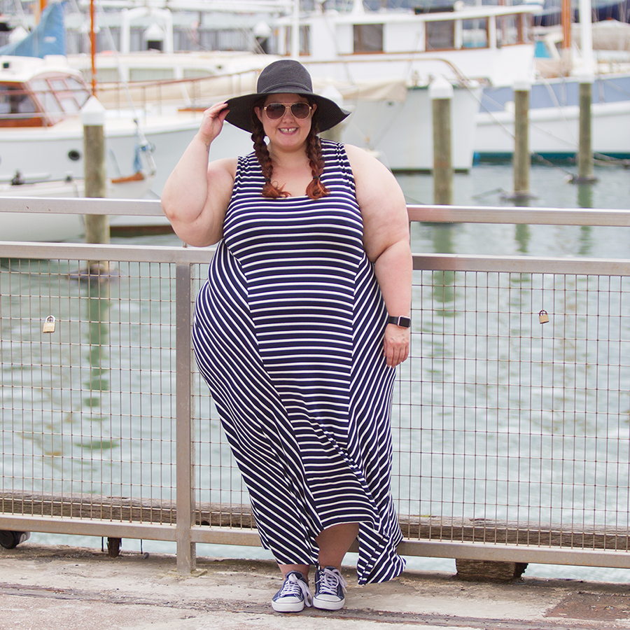 This is Meagan Kerr wears K&K Stripe Mixed Panel Dress and Wide Brim Sun Hat