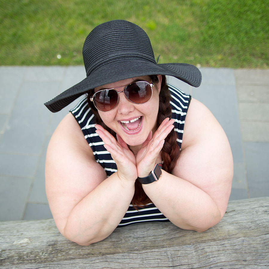 This is Meagan Kerr wears K&K Stripe Mixed Panel Dress and Wide Brim Sun Hat