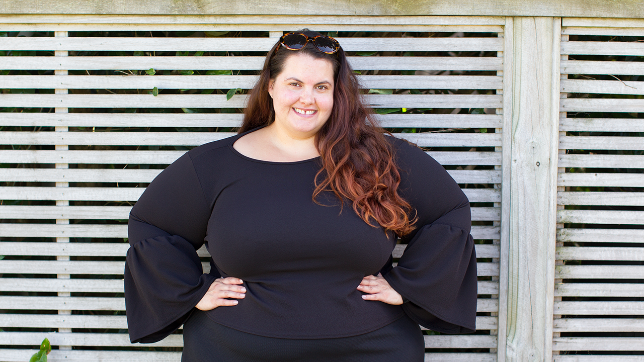 Meagan Kerr wears Boohoo Plus Tara Crepe Frill Sleeve Top in size 26