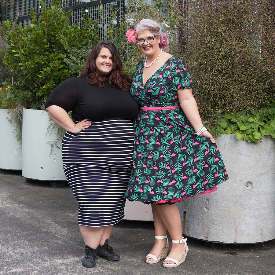 Meagan Kerr wears ASOS CURVE Turtleneck and Harlow Sweetest Taboo Skirt; Hannah Gough from Survivor New Zealand wears Lady Voluptuous Lyra Art Deco Flamingo Dress / Photo: Doug Peters, Ambient Light