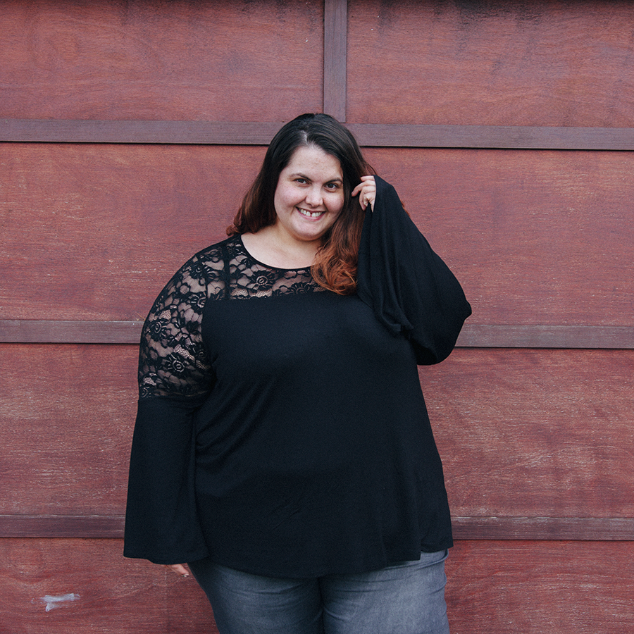 Meagan Kerr wears Lace Inset Bell Sleeve Top from Torrid