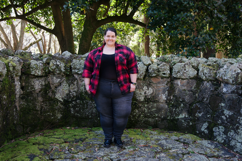 How to style a bodysuit: Plus size blogger Meagan Kerr wears Sonsee Bodysuit, Kate Madison Jeans and Flannel Button Up from The Warehouse