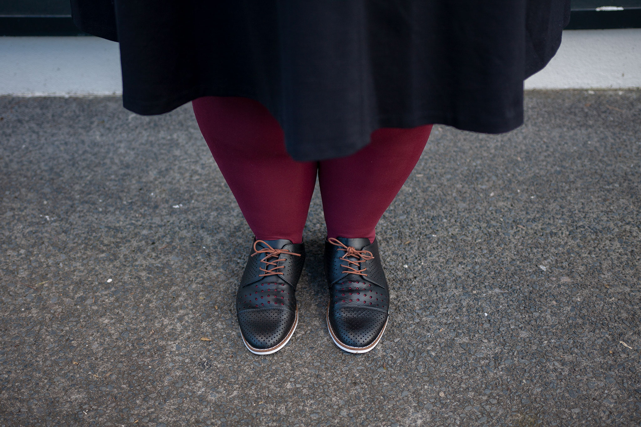 New Zealand plus size blogger Meagan Kerr wears Lane Bryant Ponte Circle Skirt, Pamela Mann 90 Denier Maxi Opaque Plus Size Tights from The Tight Spot, Emerge Anaheim Cut-out Lace Up Court Flat from Ezibuy. Photo by Doug Peters / Ambient Light