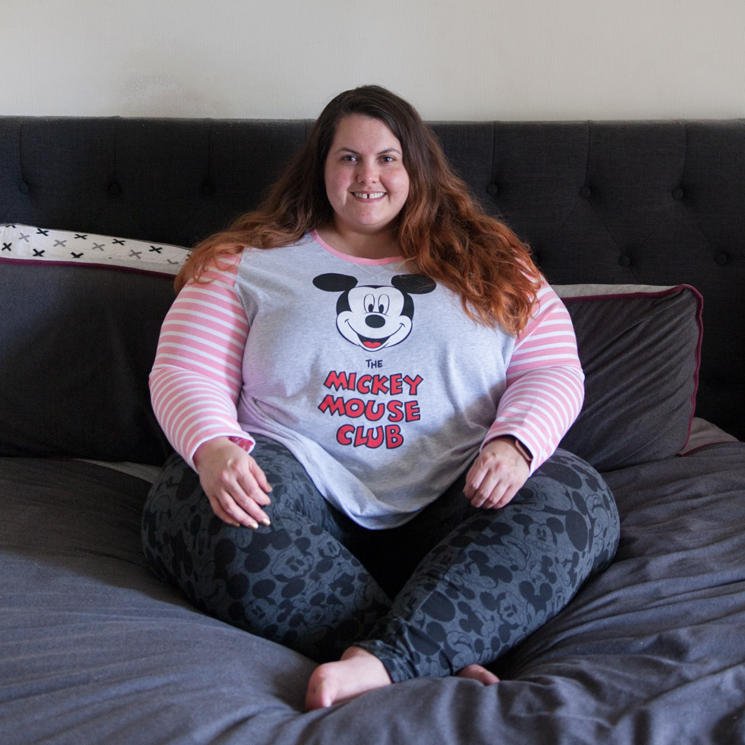 New Zealand plus size blogger Meagan Kerr wears PA Plus Mickey Mouse Club pyjama top from Peter Alexander and Disney Mickey Mouse leggings from Torrid. Photo by Doug Peters / Ambient Light
