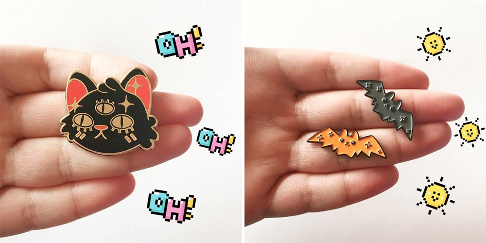 Halloween Pins: Black Three-Eyed Cat Pin, $16.94 from Oh You Fox | Orange and Black Bat Pins, $16.94 from Oh You Fox