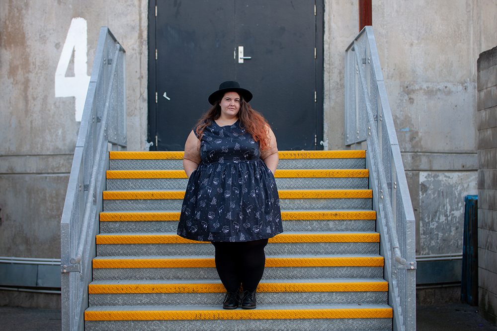 Kind of magic: New Zealand plus size fashion blogger Meagan Kerr wears Li'l Miss Meanie Dress by Cutting Shapes Club, Lida Seamless Plus Size Leggings from The Tight Spot, Limited Edition Lecester Boots from Number One Shoes and ASOS DESIGN Wide Brim Pork Pie Hat from ASOS