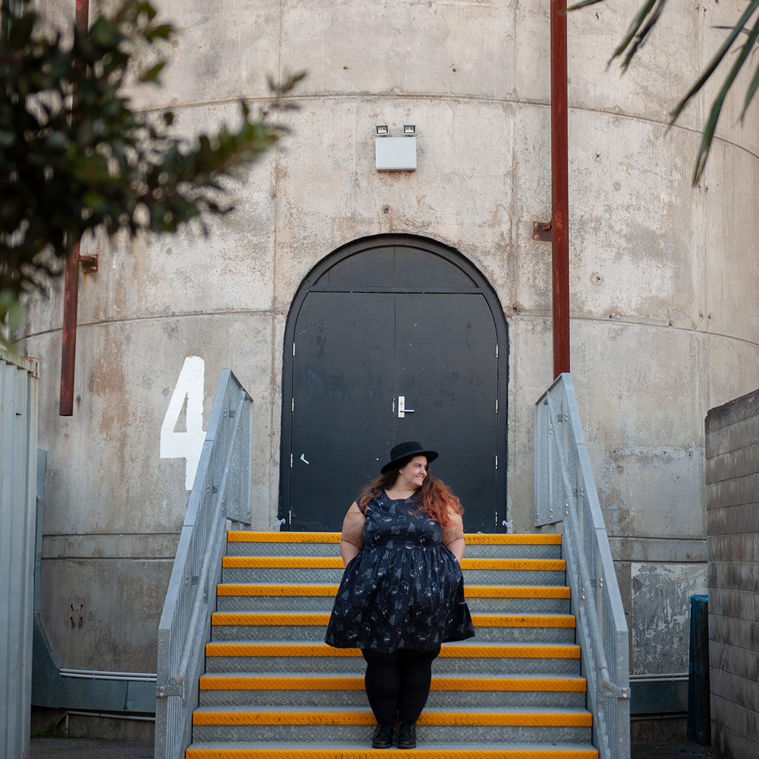 Kind of magic: New Zealand plus size fashion blogger Meagan Kerr wears Li'l Miss Meanie Dress by Cutting Shapes Club, Lida Seamless Plus Size Leggings from The Tight Spot, Limited Edition Lecester Boots from Number One Shoes and ASOS DESIGN Wide Brim Pork Pie Hat from ASOS