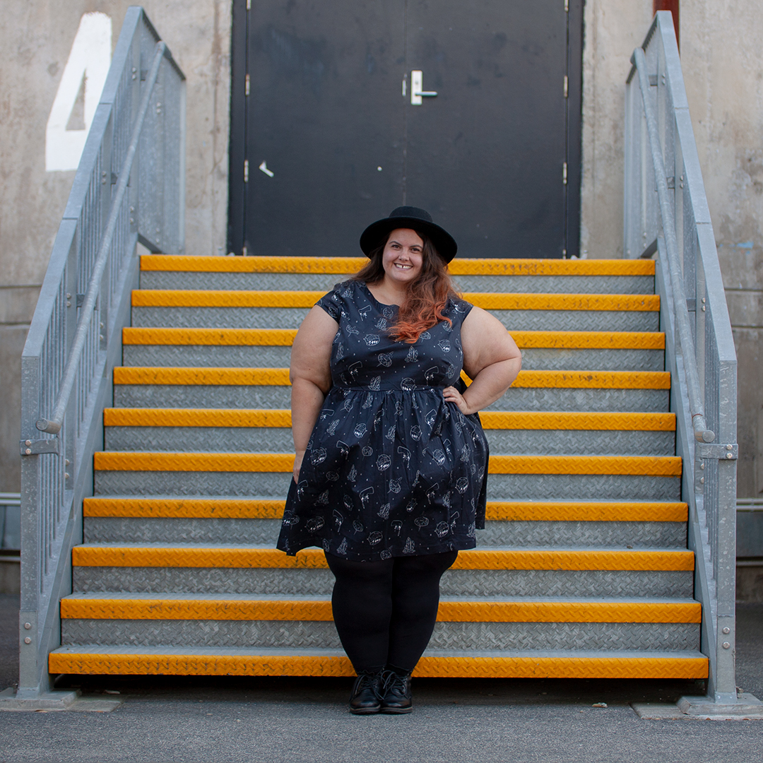 Kind of magic: New Zealand plus size fashion blogger Meagan Kerr wears Li'l Miss Meanie Dress by Cutting Shapes Club, Lida Seamless Plus Size Leggings from The Tight Spot, Limited Edition Lecester Boots from Number One Shoes and ASOS DESIGN Wide Brim Pork Pie Hat from ASOS