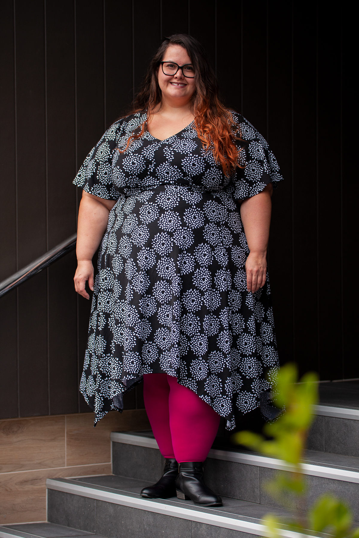 Plus size fashion blogger Meagan Kerr wears Snag Tights in Raspberry Pie