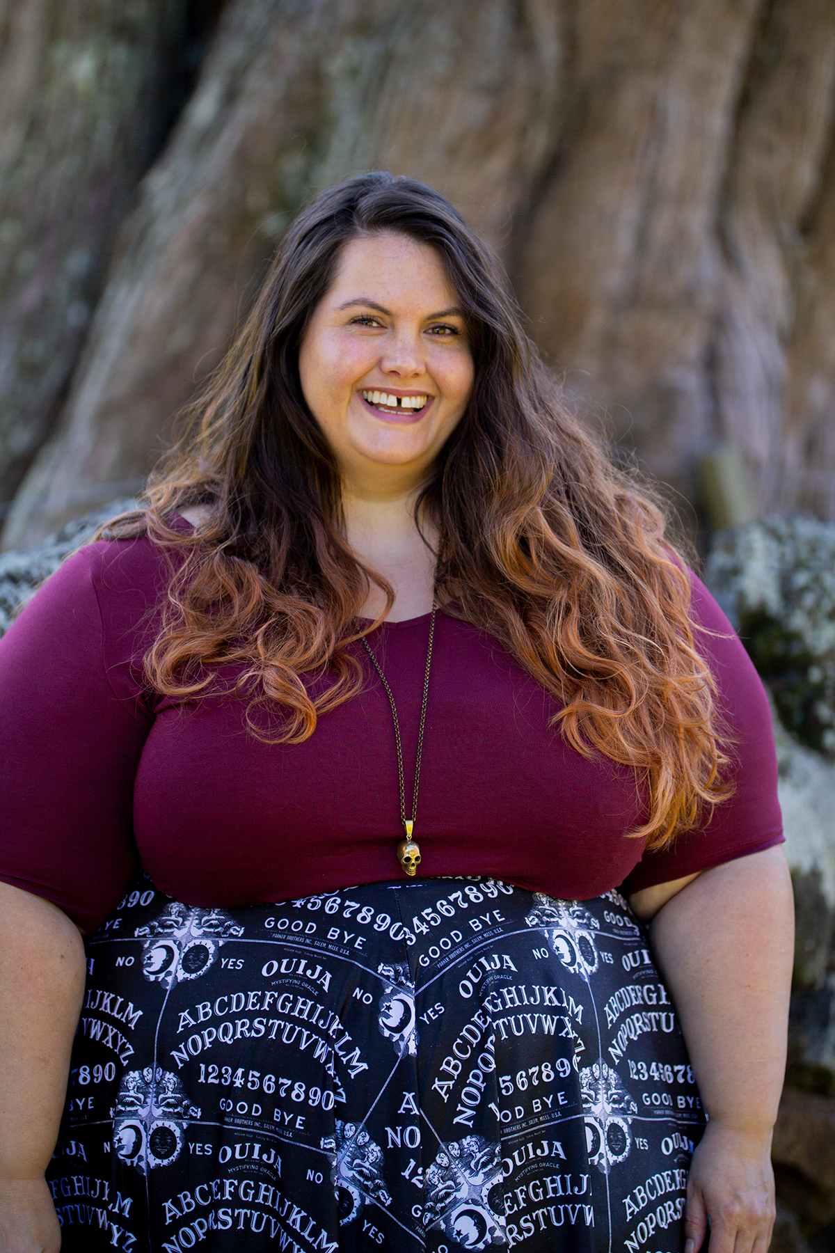 New Zealand plus size blogger Meagan Kerr wears v-neck tunic from Torrid, ouija print skirt from Joolz Fashion, stockings from Snag Tights, boots from Autograph Fashion and skull necklace from Luke Adore Jewellery