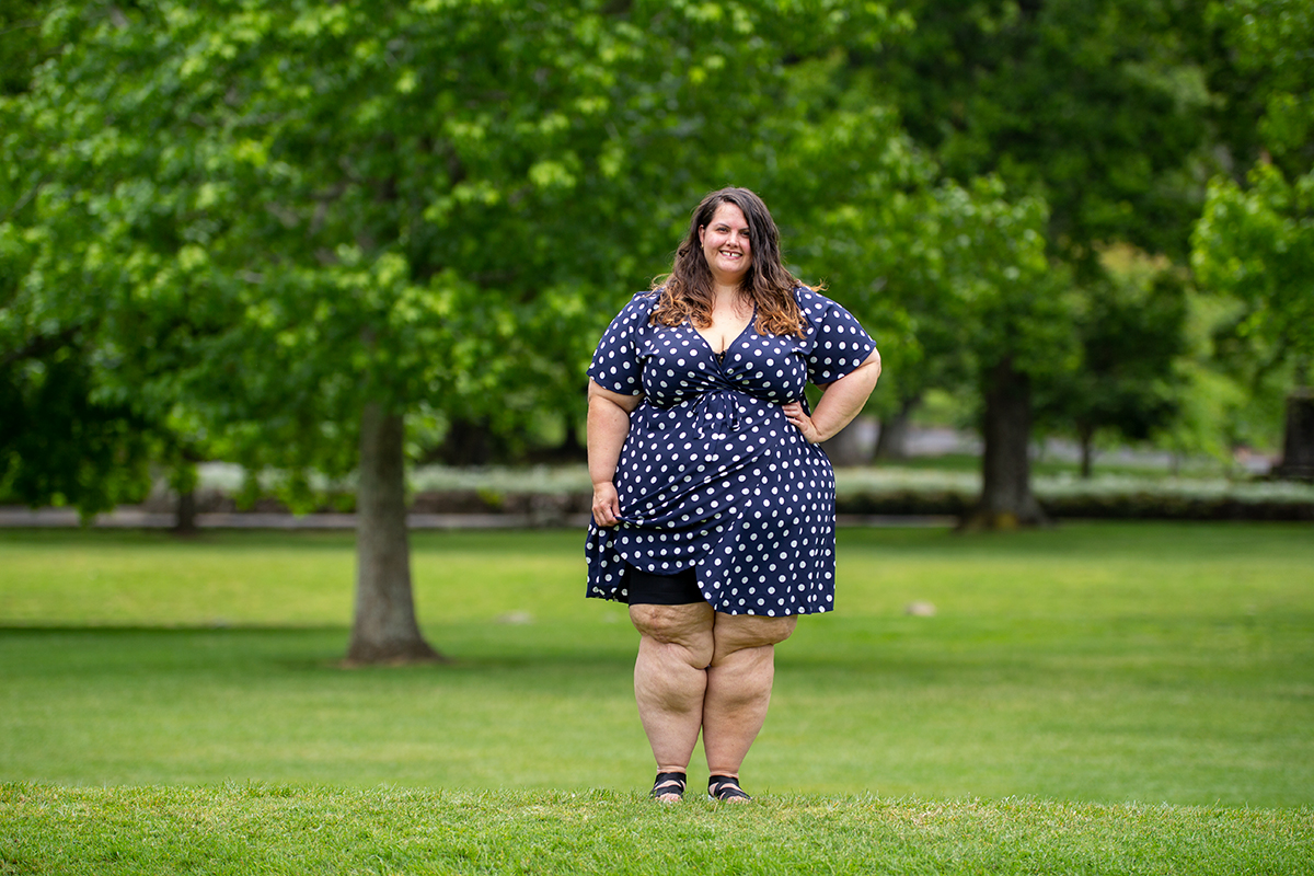 New Zealand plus size fashion blogger Meagan Kerr wears Ruby and Rain Rosa Wrap Dress, Snag Tights Chub Rub Shorts in Black, and Ziera Utah Sandals