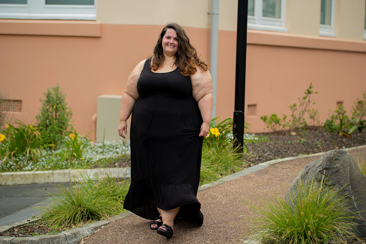 New Zealand plus size fashion blogger Meagan Kerr wears Torrid Super Soft Favourite Tunic Tank, Garage+ Maxi Skirt from The Warehouse and Mason Slides from Ziera Shoes