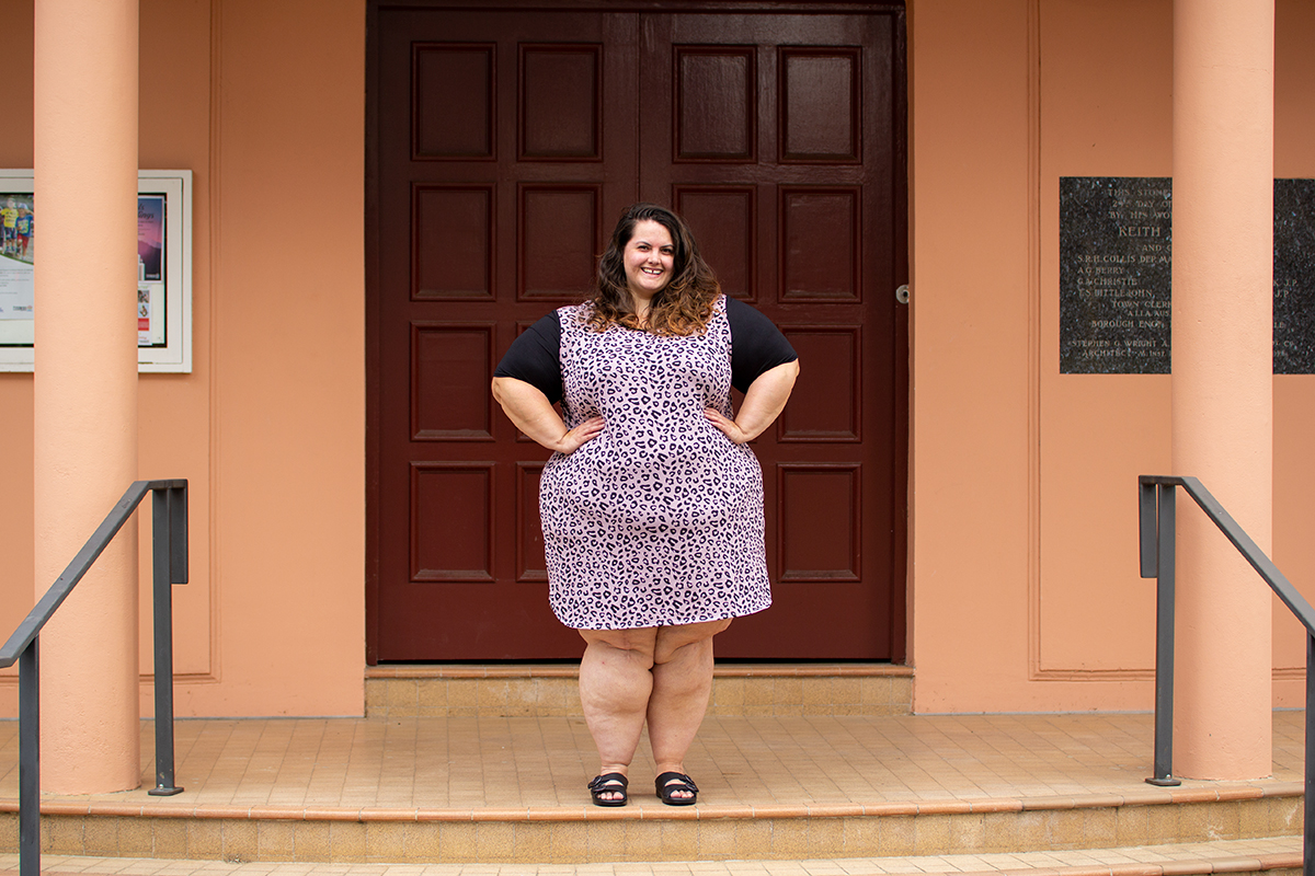 New Zealand plus size fashion blogger Meagan Kerr wears Ruby & Rain Briar Dress in pink animal