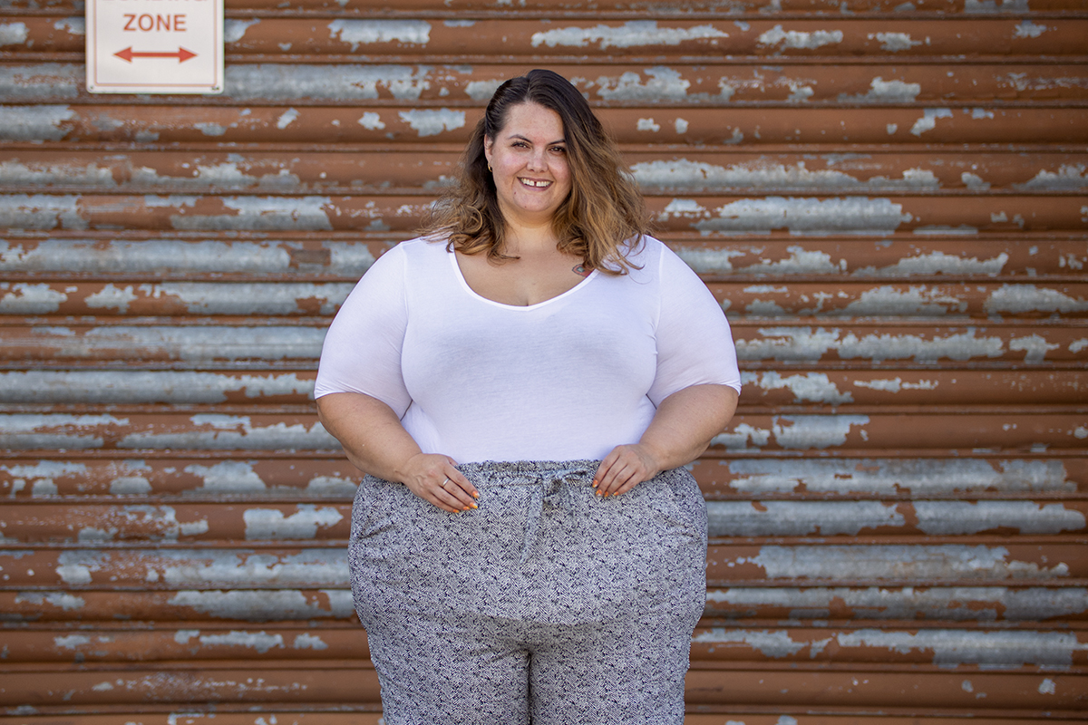 New Zealand plus size blogger Meagan Kerr wears Torrid White Favourite Tunic Tee and Torrid Black Herringbone Ponte Drawstring Paperbag Pants with vintage ring. Nails by Penny from Hard Lacquer