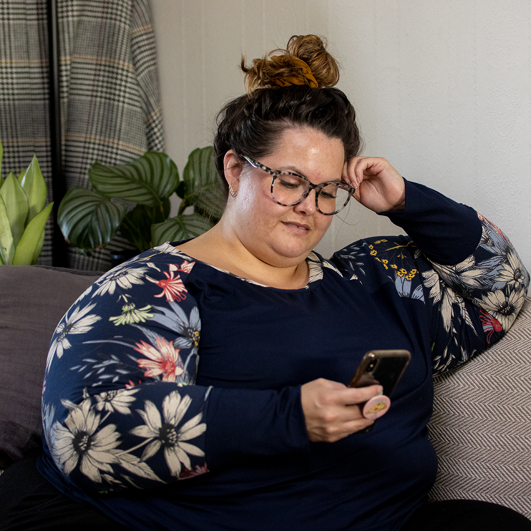 New Zealand plus size fashion blogger Meagan Kerr wears Ruby & Rain Sage Top in navy floral and Ruby & Rain Lilac Pants in black with Country Road CR SUN RX 29 glasses from Specsavers