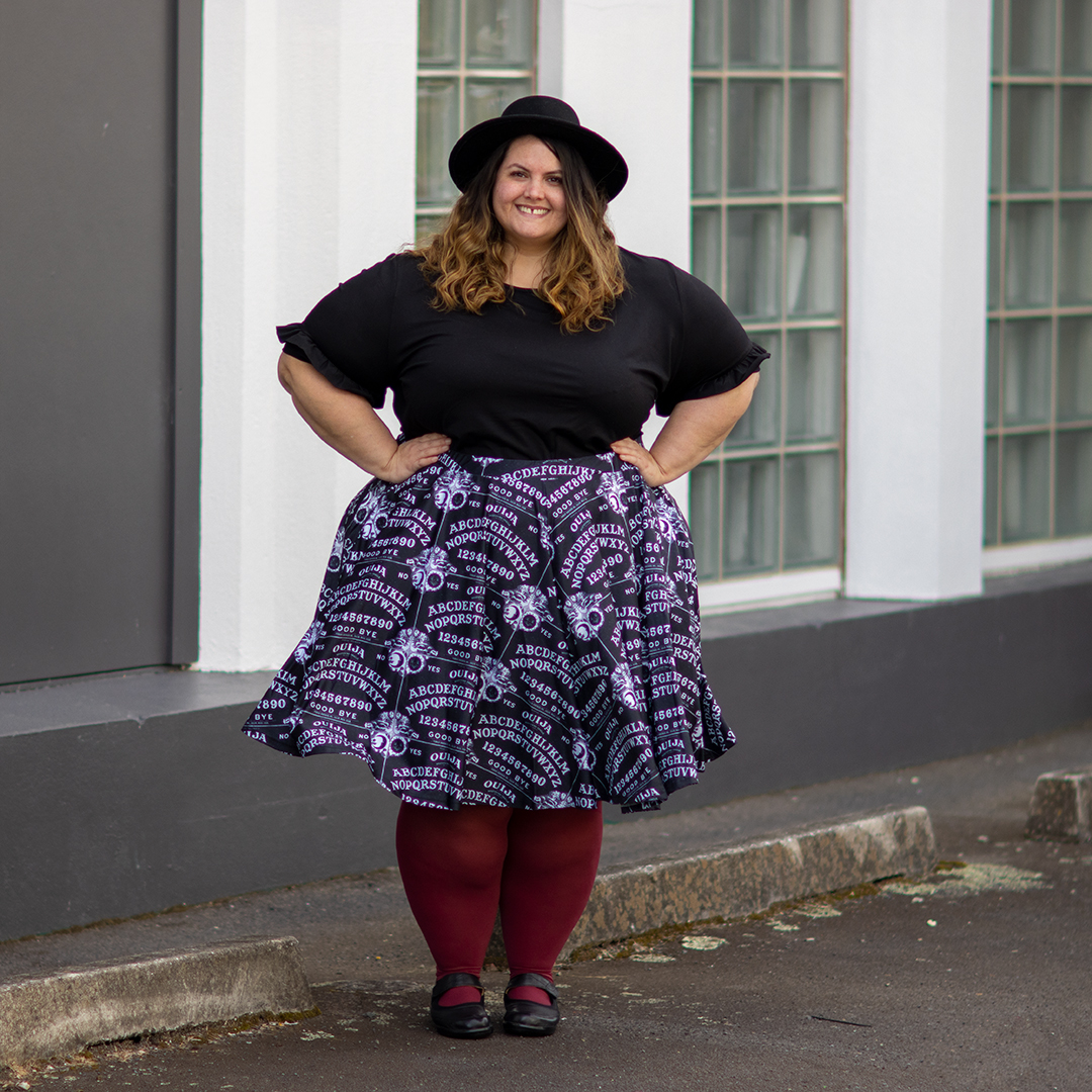 New Zealand plus size fashion blogger Meagan Kerr wears Nettle Tee from Ruby & Rain, Ouija Girl skater skirt from Joolz Fashion, Raspberry Pie Snag Tights, ABBY Mary-Janes from Ziera and ASOS Design Pork Pie Hat