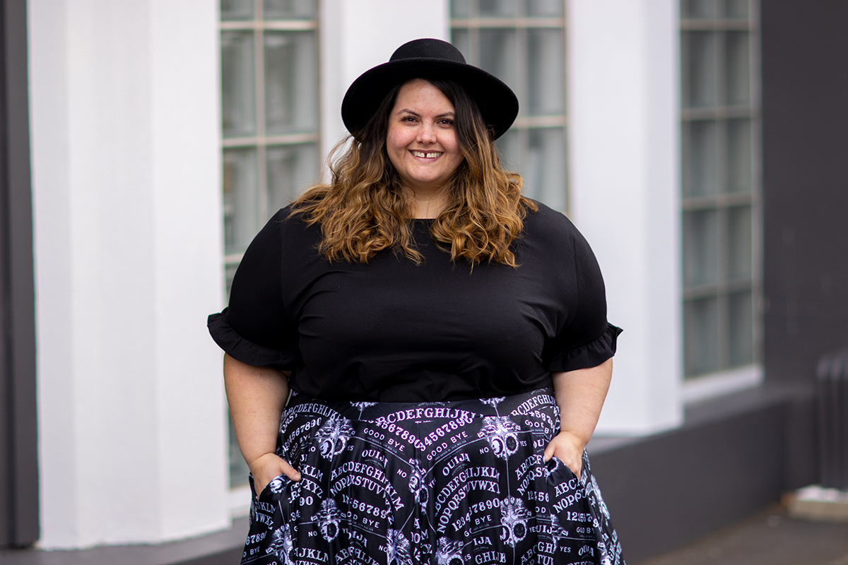 New Zealand plus size fashion blogger Meagan Kerr wears Nettle Tee from Ruby & Rain, Ouija Girl skater skirt from Joolz Fashion and ASOS Design Pork Pie Hat