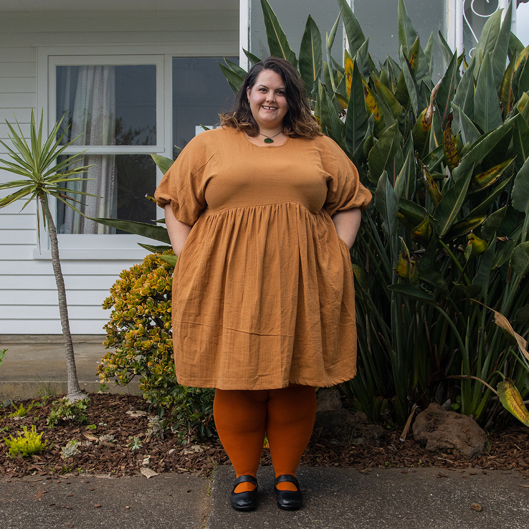 New Zealand plus size fashion blogger Meagan Kerr wears Noelle Dress in Bark, made by Sloan with Snag Tights in Toffee Apple and Abby Mary-Janes from Ziera