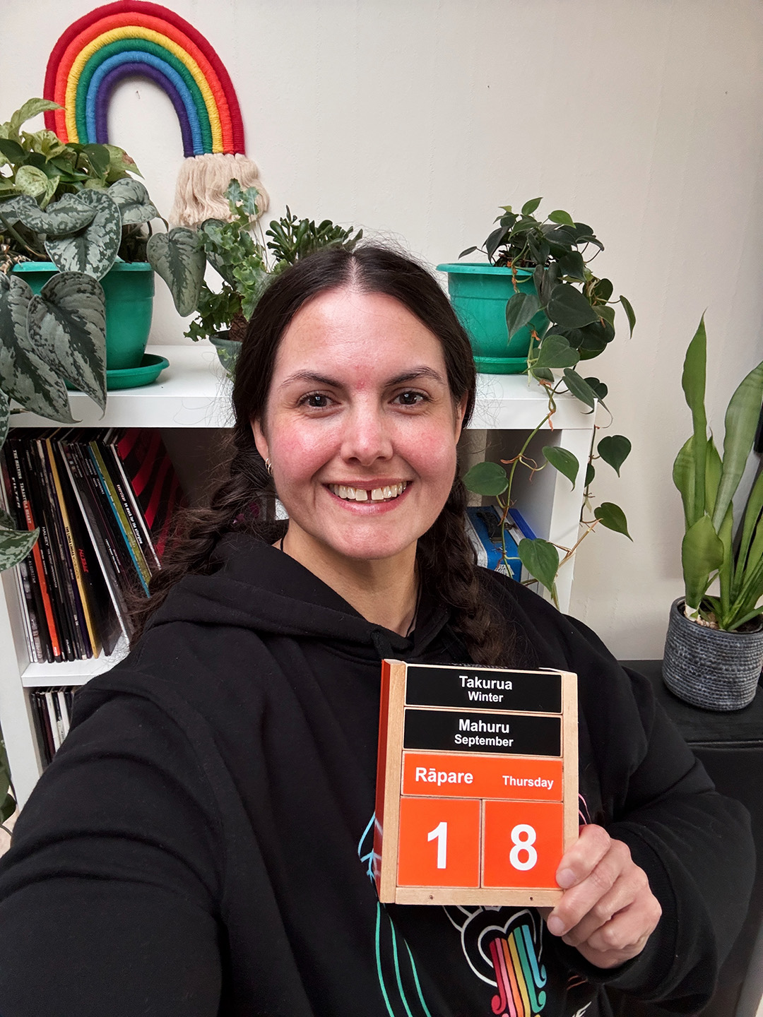 Meagan holds an Easy As Kids Te Reo Maori Block Calendar that she built.